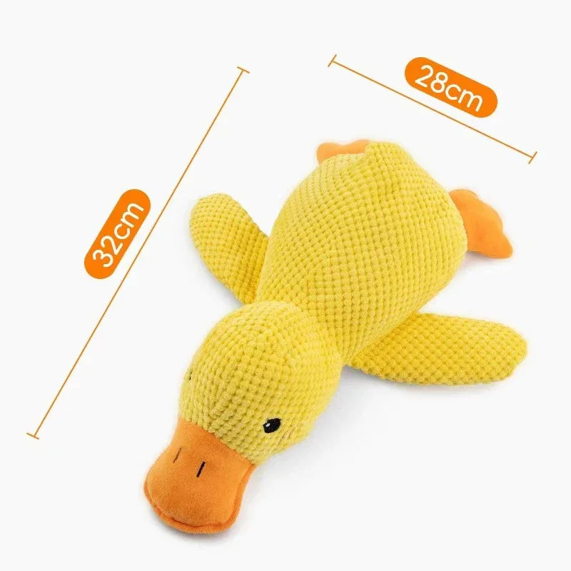 Dog sleeping with a dog hug duck toys to relieve boredom of little yellow duck pet interactive plush doll pet supplies ﻿